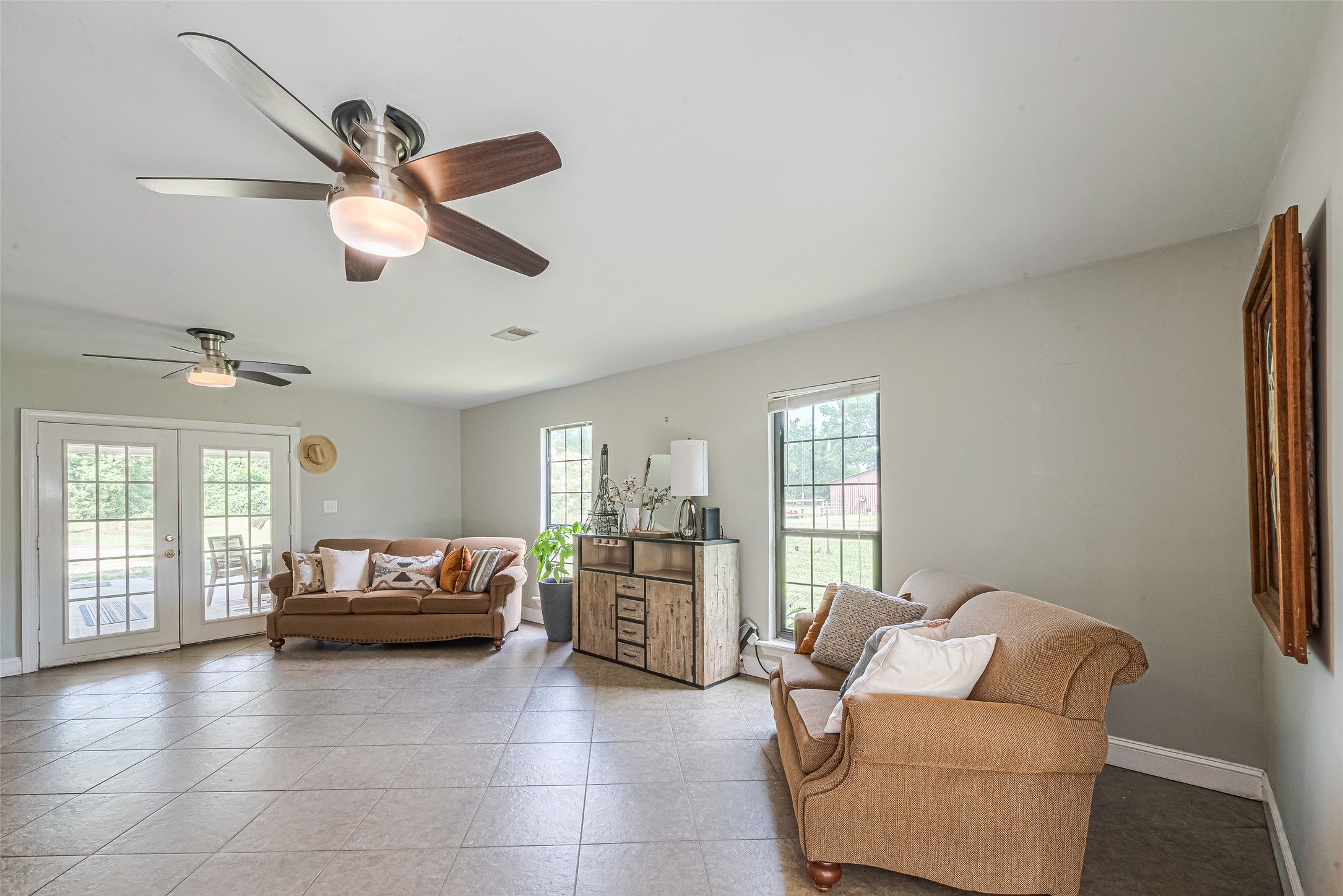 24314 Anderson Street Huffman, TX 77336 - Photo 29 of 48 a living room with furniture and a window