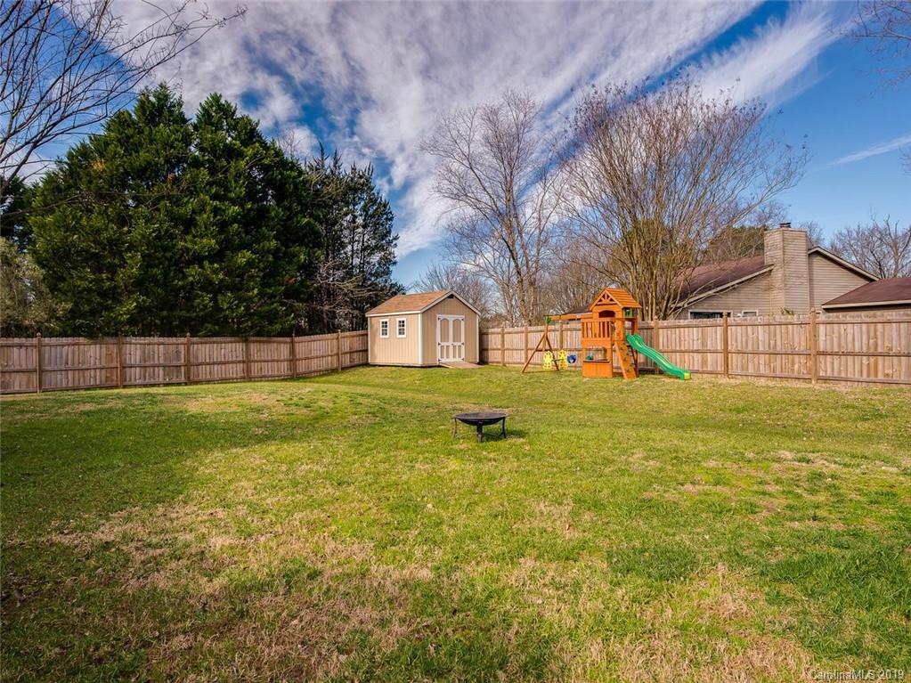 10118 Fairway Ridge Road Charlotte, NC 28277 - Photo 22 of 23 a view of swimming pool with a yard