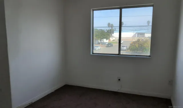 an empty room with a window
