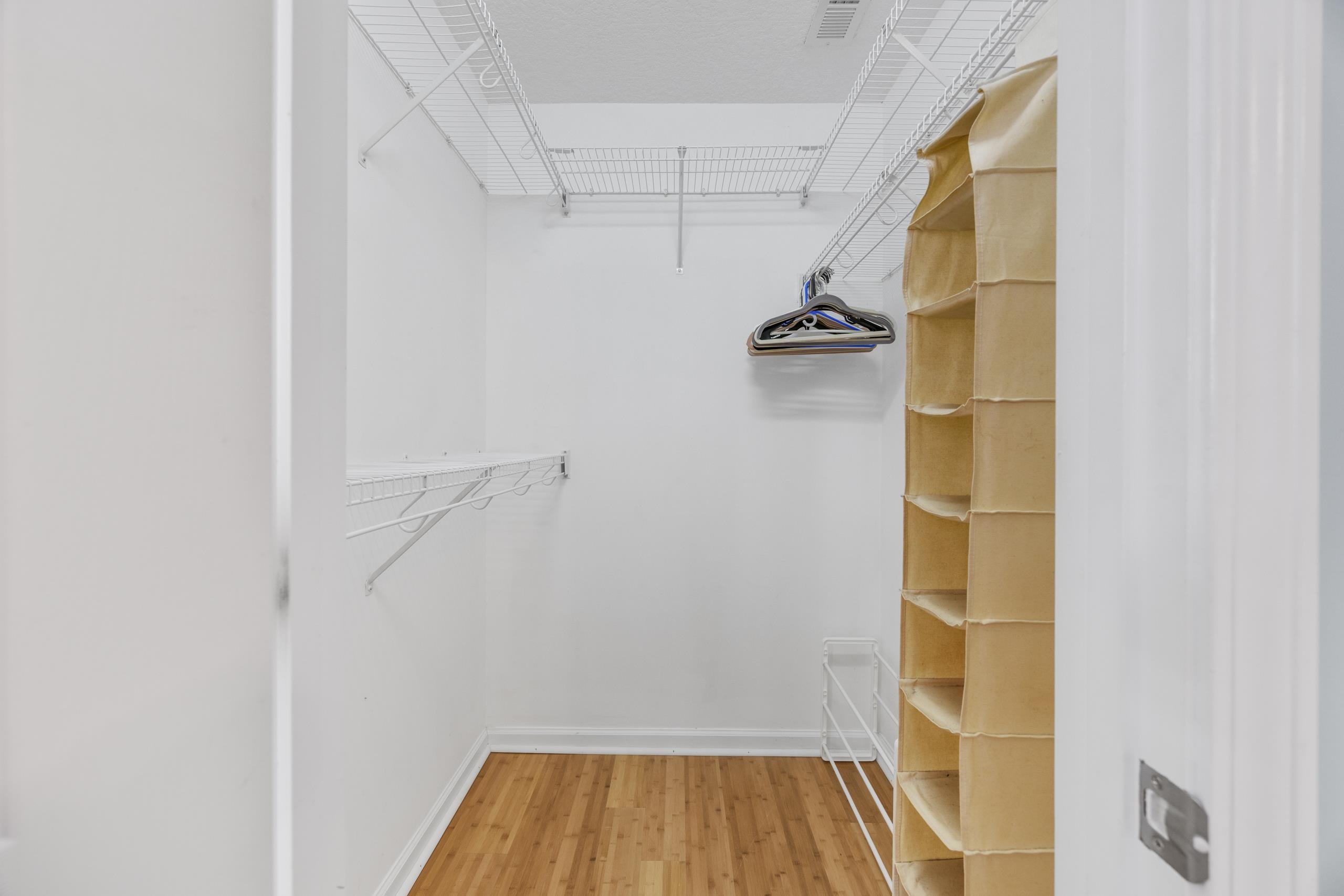 722 Downing Court Longs, SC 29568 - Photo 15 of 40 Walk in closet featuring light wood-style flooring