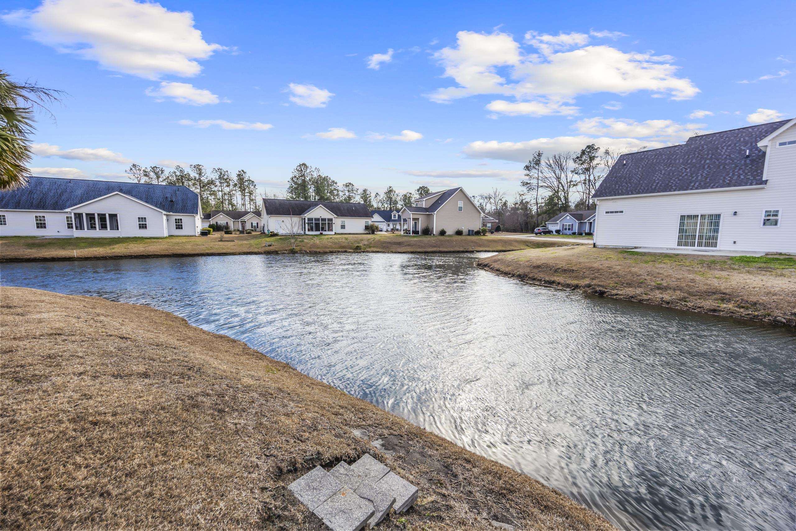 722 Downing Court Longs, SC 29568 - Photo 31 of 40 Water view featuring nearby suburban area