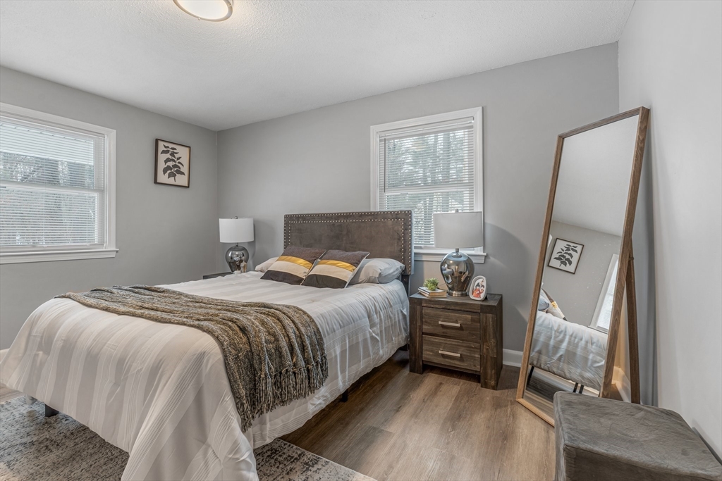 263 Great Road Shirley, MA 01464 - Photo 15 of 30 a bedroom with a bed and a window