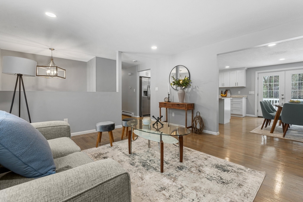 263 Great Road Shirley, MA 01464 - Photo 8 of 30 a living room with furniture and a wooden floor