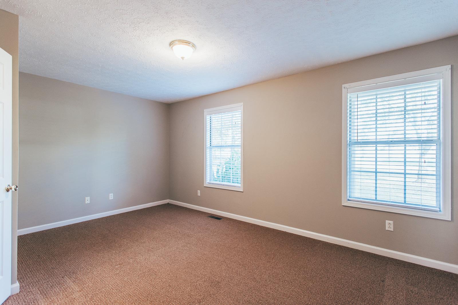 557 S Road Cottontown, TN 37048 - Photo 17 of 24 an empty room with a window