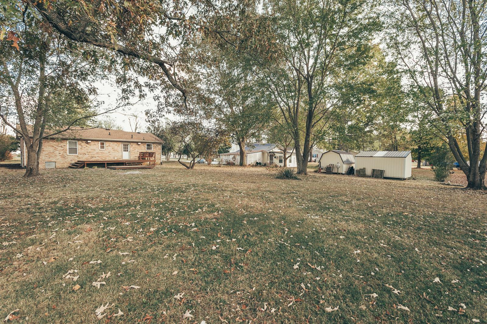 557 S Road Cottontown, TN 37048 - Photo 23 of 24 a view of a yard with tree s