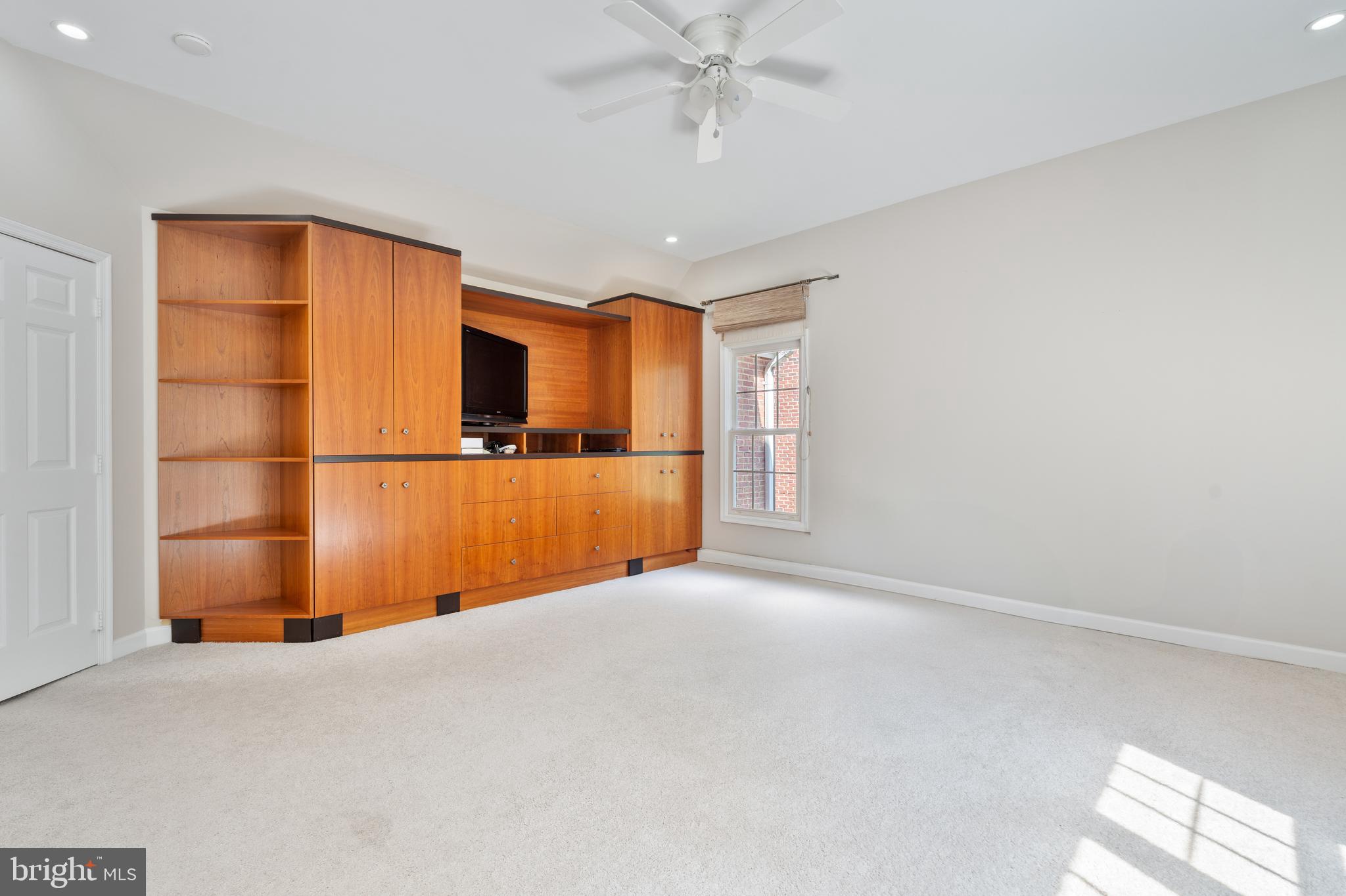 7815 Stable Way Potomac, MD 20854 - Photo 18 of 36 a view of a livingroom with a fireplace