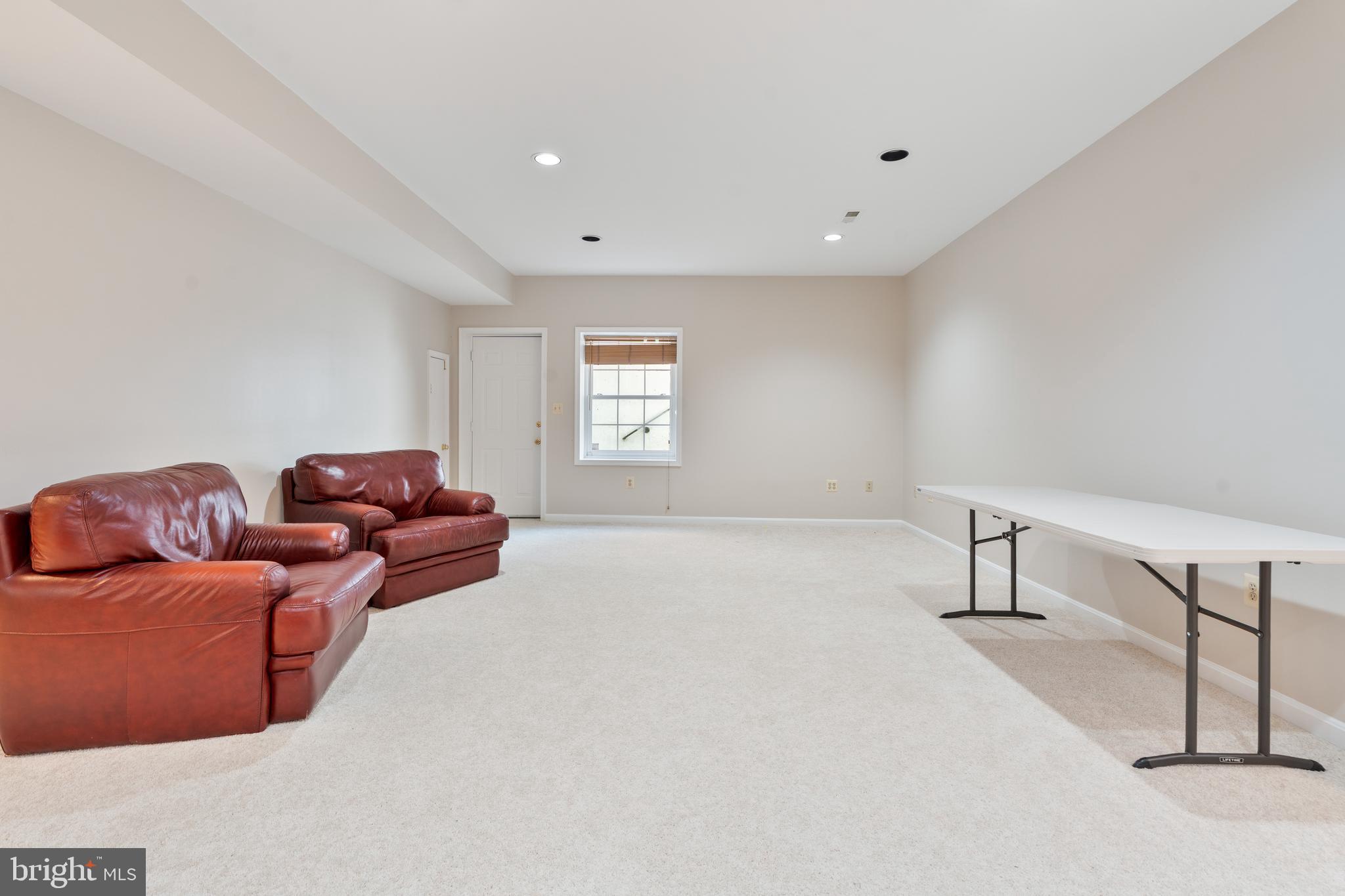 7815 Stable Way Potomac, MD 20854 - Photo 29 of 36 a living room with furniture