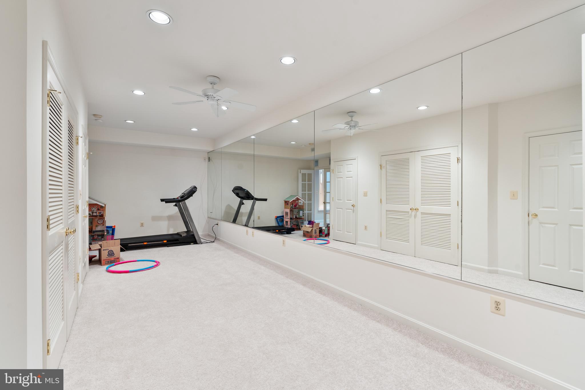 7815 Stable Way Potomac, MD 20854 - Photo 32 of 36 a view of a room with gym equipment