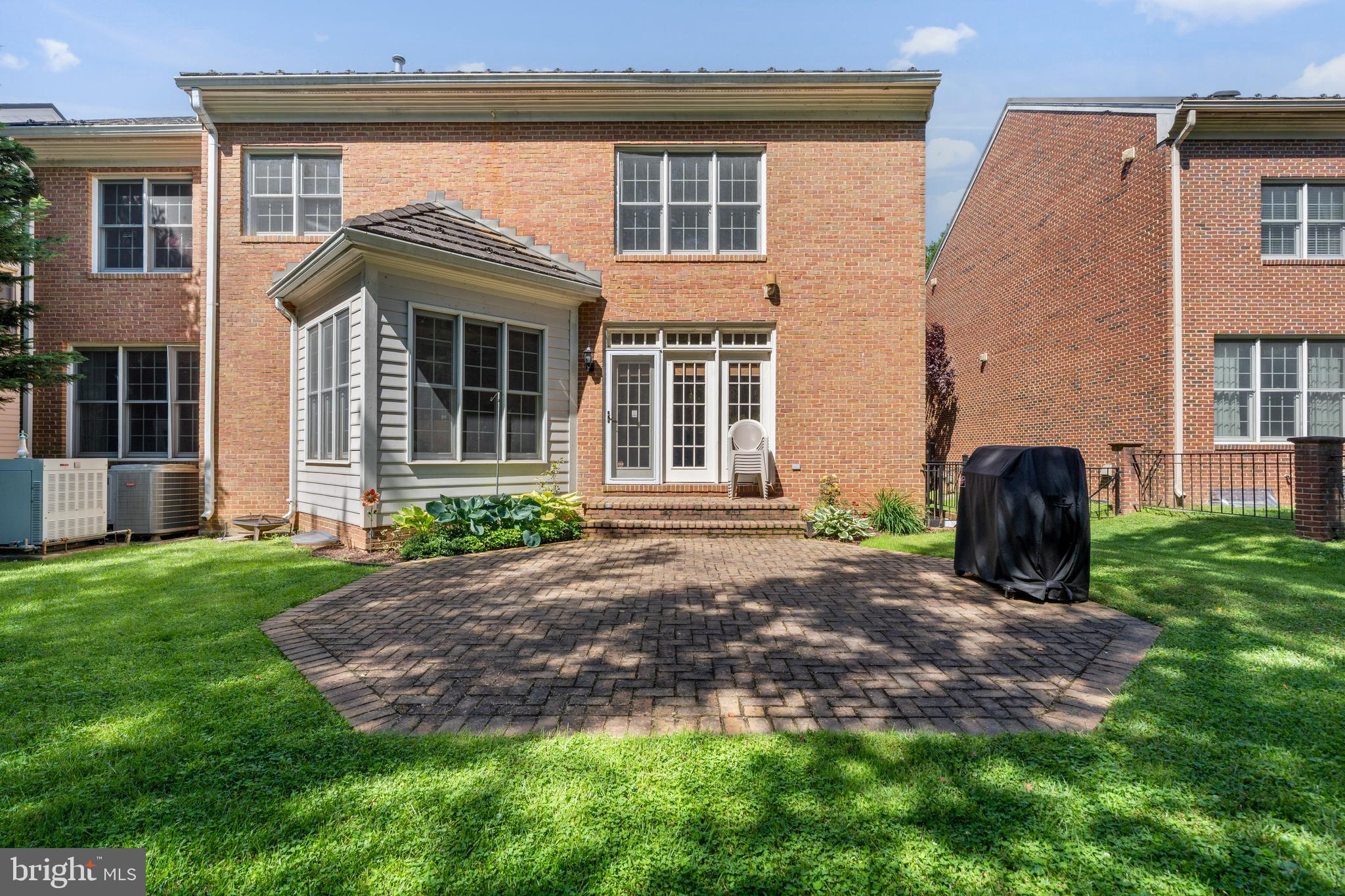 7815 Stable Way Potomac, MD 20854 - Photo 35 of 36 front view of a house with a yard