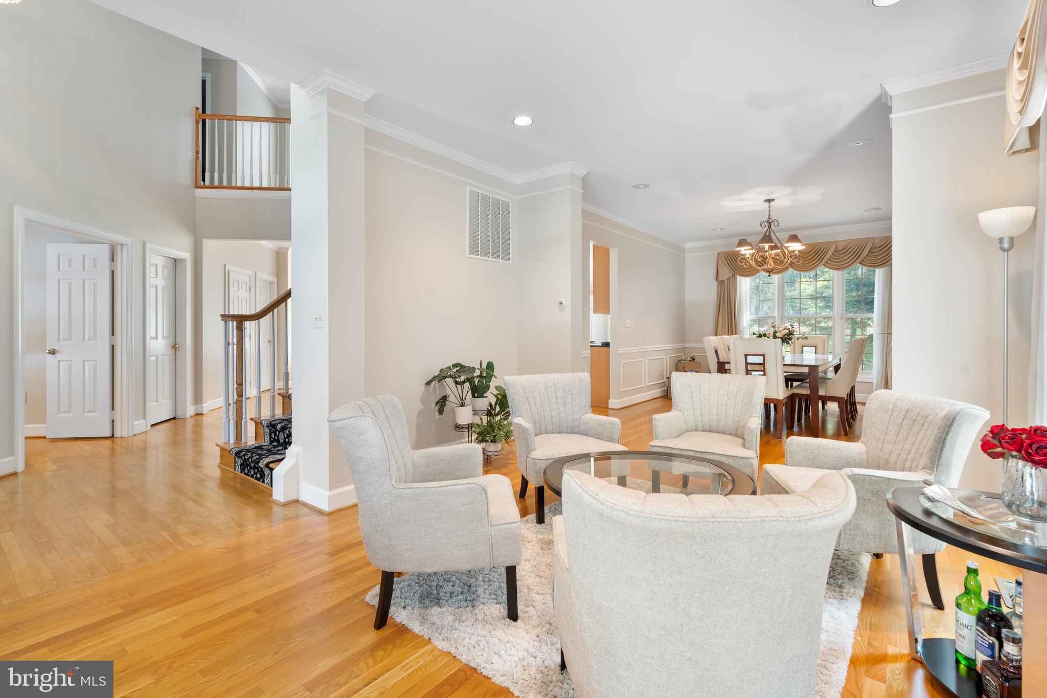 7815 Stable Way Potomac, MD 20854 - Photo 6 of 36 a living room with furniture and wooden floor
