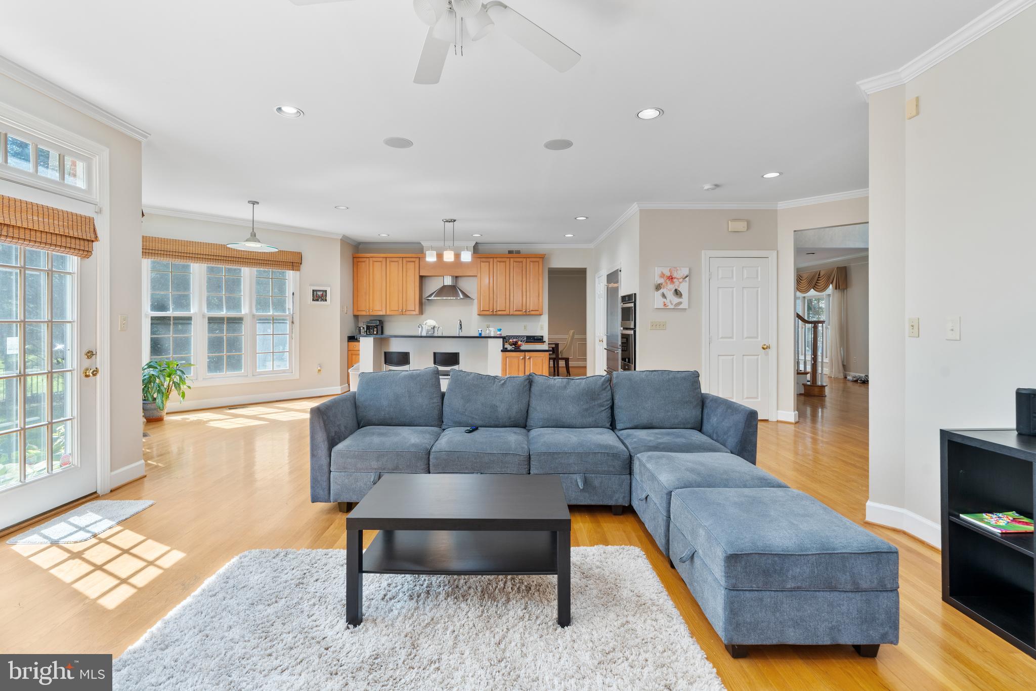 7815 Stable Way Potomac, MD 20854 - Photo 10 of 36 a living room with furniture and a flat screen tv