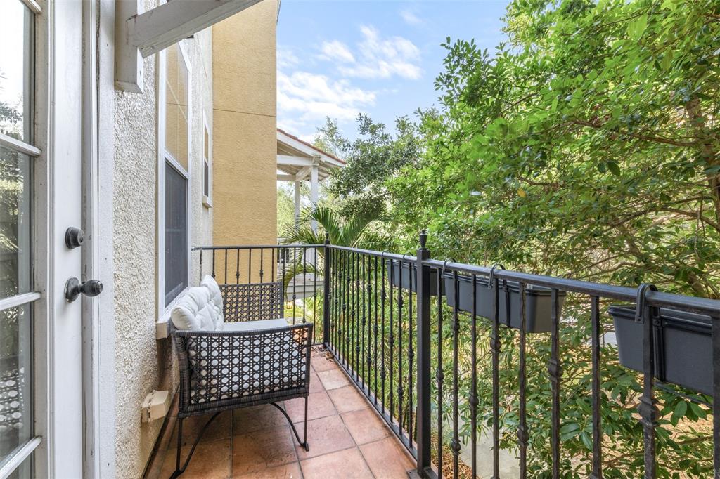 962 Sombra Street Tampa, FL 33619 - Photo 14 of 24 a view of a balcony with furniture