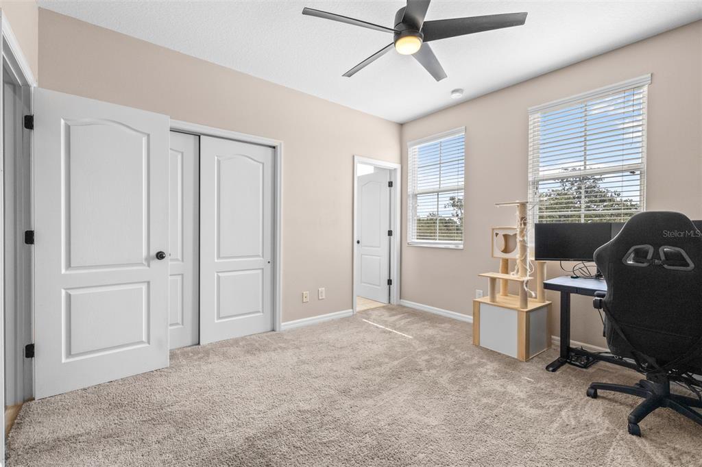 962 Sombra Street Tampa, FL 33619 - Photo 20 of 24 a view of a workspace with furniture and a window