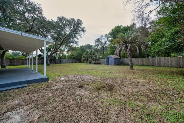 a view of a backyard with a garden