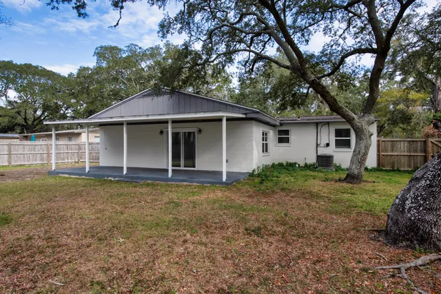 a view of a house with a back yard