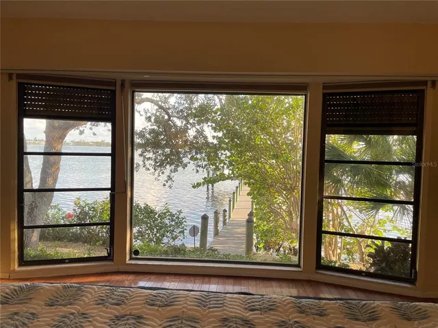 a view of a room that has a window