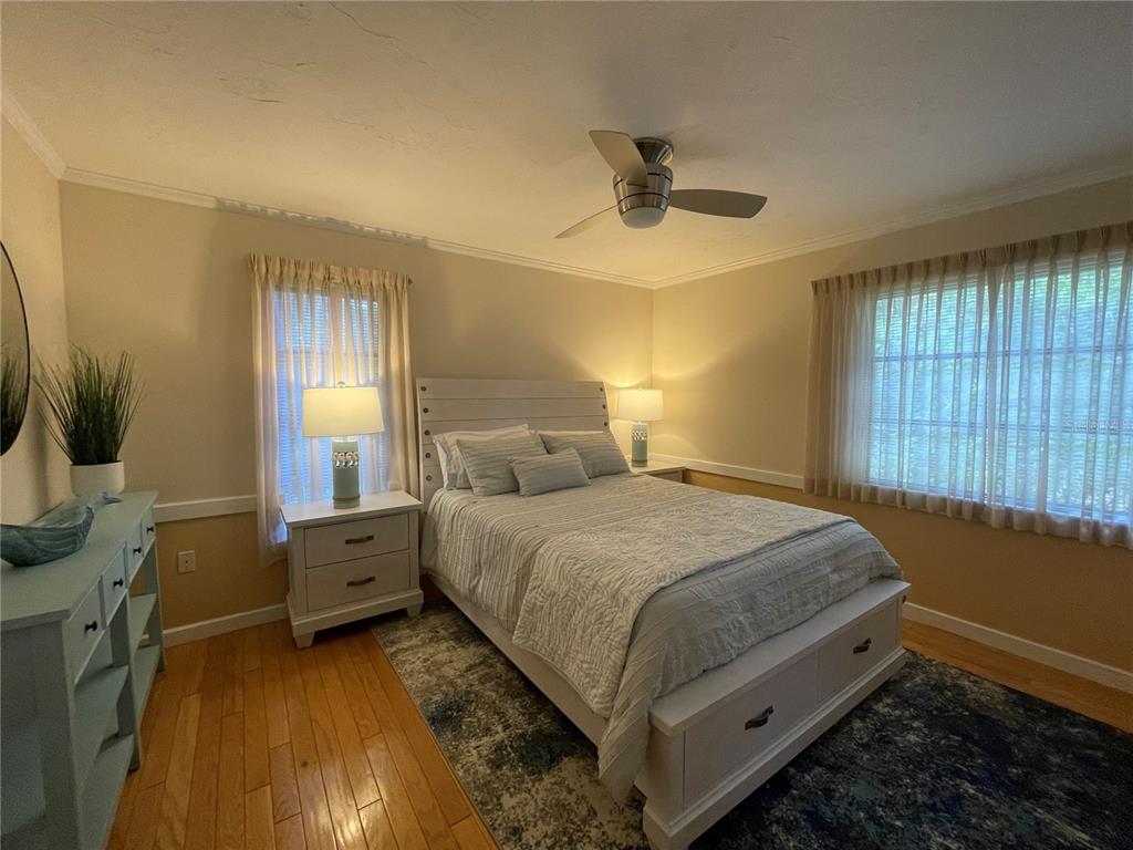 421 Waterside Lane Nokomis, FL 34275 - Photo 32 of 48 a bed room with a bed and a window
