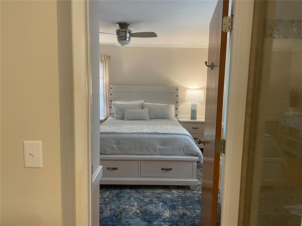 421 Waterside Lane Nokomis, FL 34275 - Photo 36 of 48 a bathroom with a sink and a mirror