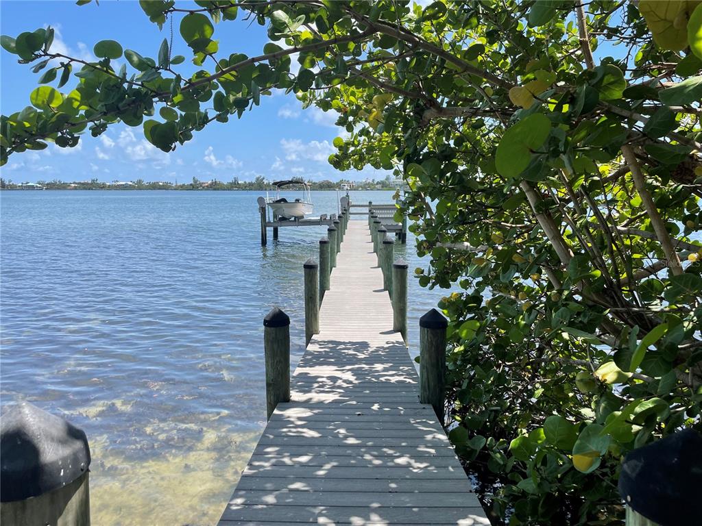 421 Waterside Lane Nokomis, FL 34275 - Photo 4 of 48 a view of a pathway in a yard
