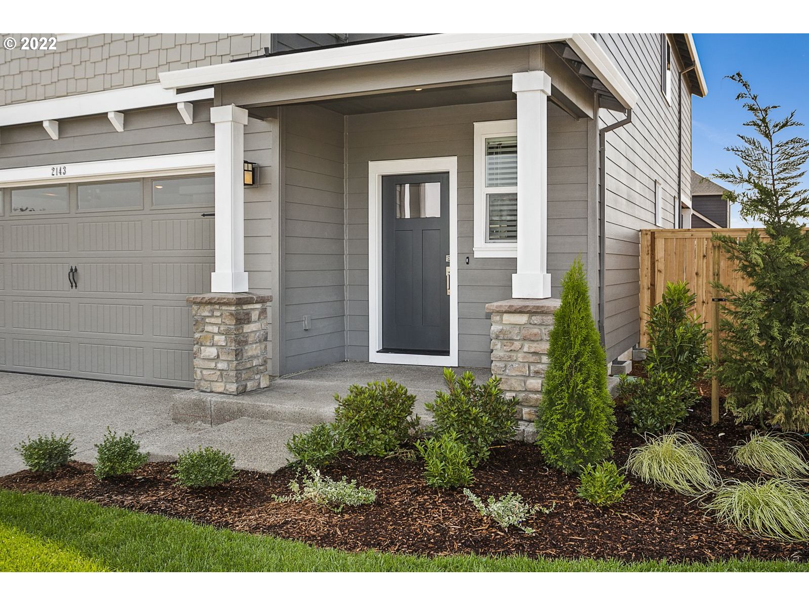 8534 North 5th Street, Unit LT 32 Ridgefield, WA 98642 - Photo 2 of 26 a view of a front of a house with a yard