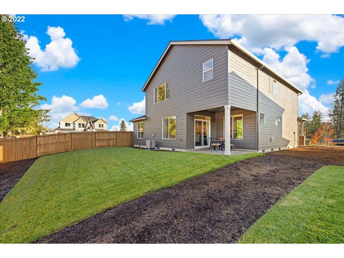 8534 North 5th Street, Unit LT 32 Ridgefield, WA 98642 - Photo 26 of 26 a view of a house with a yard