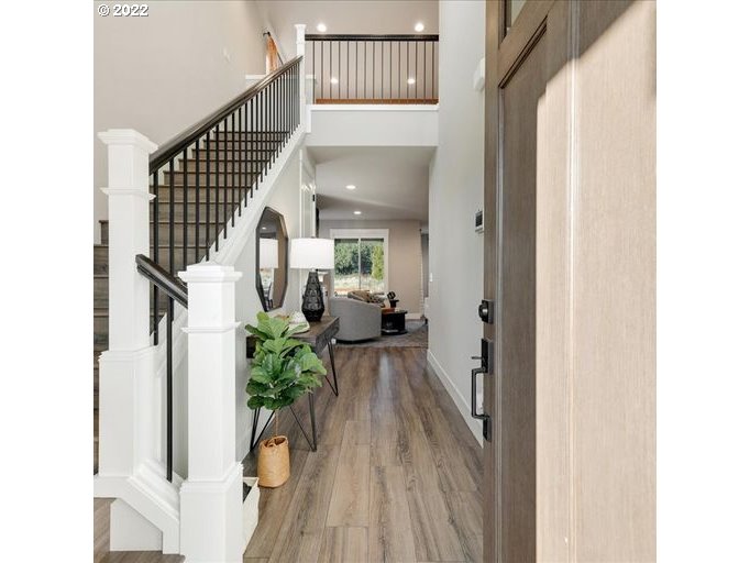 8534 North 5th Street, Unit LT 32 Ridgefield, WA 98642 - Photo 3 of 26 a view of entryway and hall with wooden floor