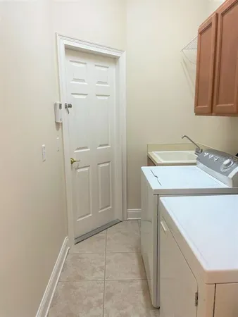 a bathroom with a sink a vanity and a mirror