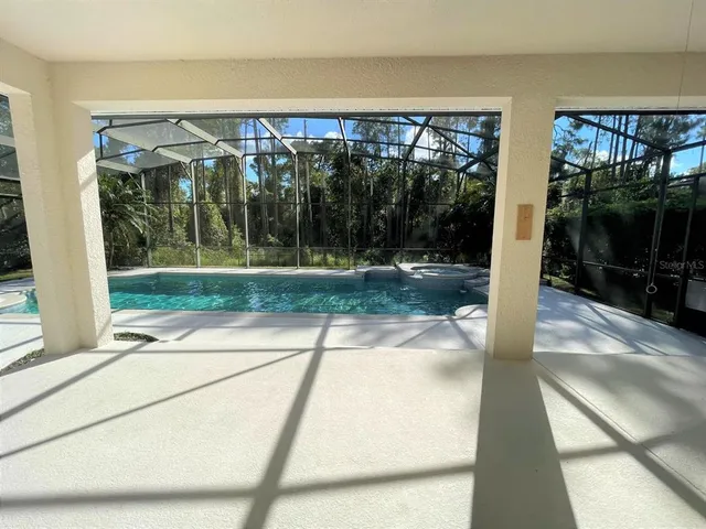 a view of a porch with a yard