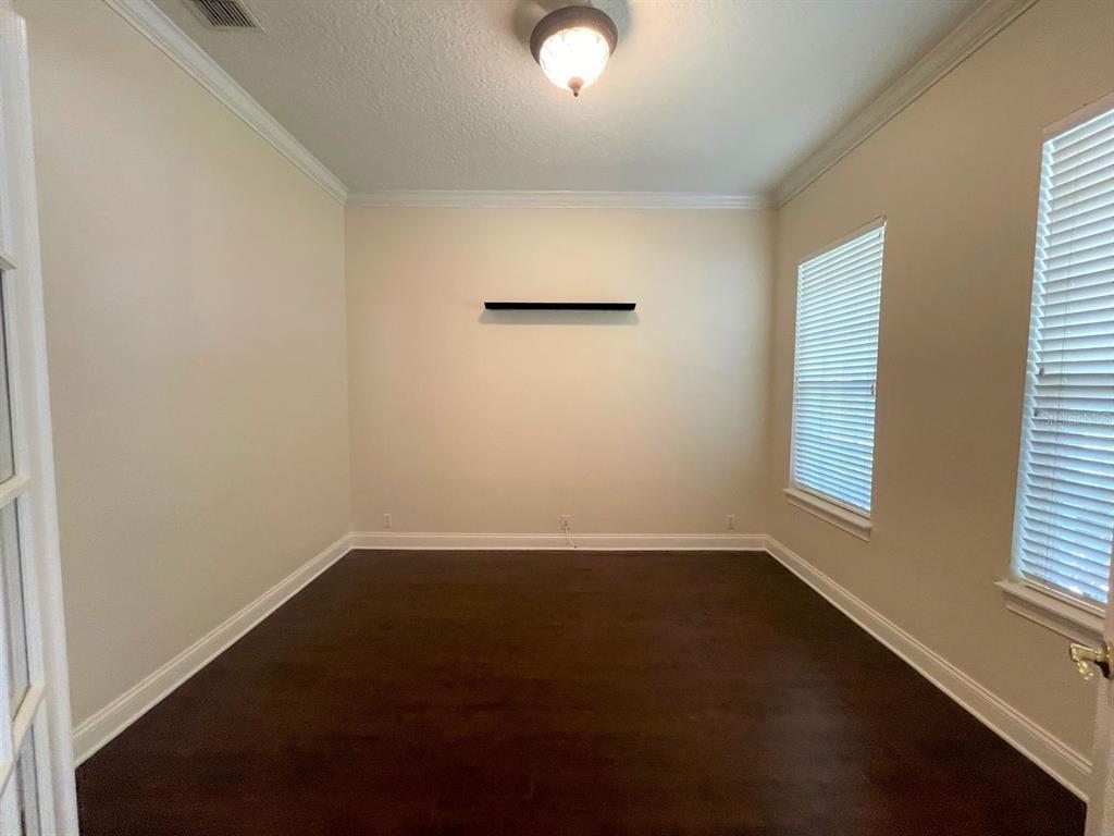 8447 Bowden Way Windermere, FL 34786 - Photo 3 of 21 an empty room with a window
