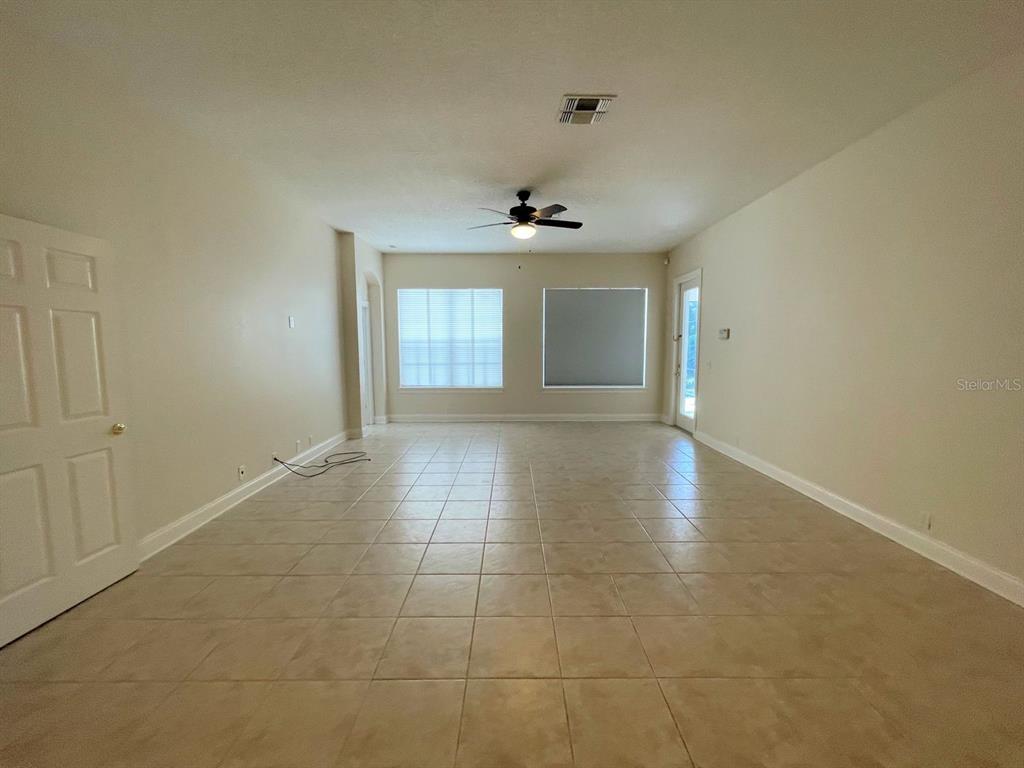8447 Bowden Way Windermere, FL 34786 - Photo 6 of 21 a view of an empty room with a window