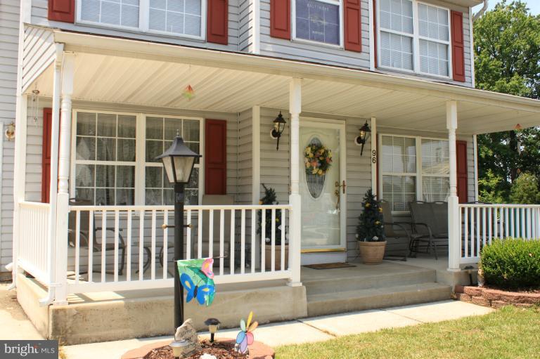 96 Yew Road Baltimore, MD 21221 - Photo 1 of 25 a front view of a building with glass door