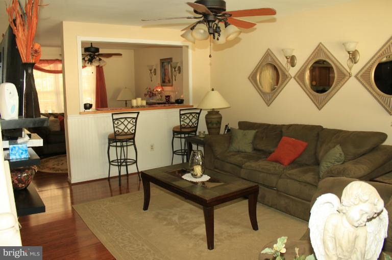 96 Yew Road Baltimore, MD 21221 - Photo 15 of 25 a living room with furniture and a table