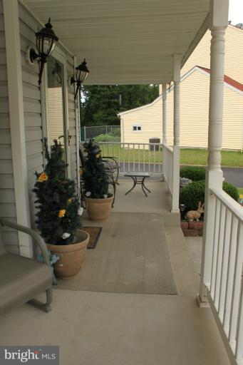 96 Yew Road Baltimore, MD 21221 - Photo 17 of 25 a view of a porch with seating space