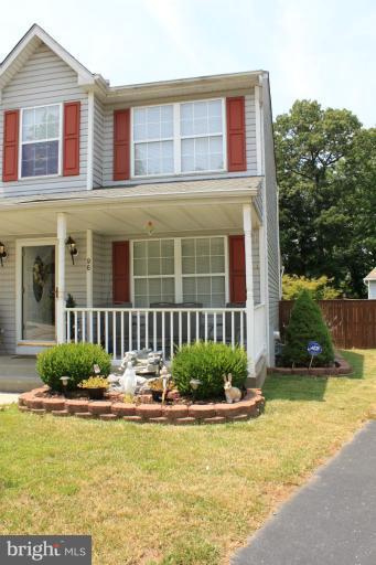 96 Yew Road Baltimore, MD 21221 - Photo 3 of 25 a front view of a house with a yard