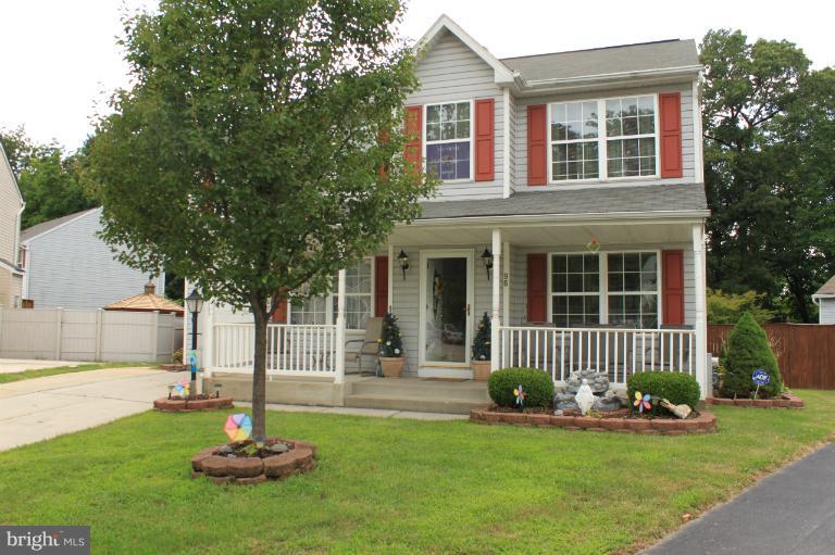 96 Yew Road Baltimore, MD 21221 - Photo 24 of 25 a front view of a house with a garden