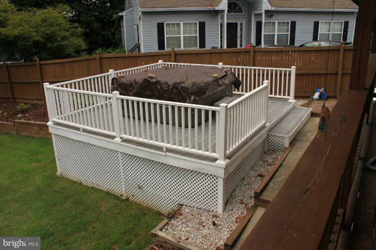 96 Yew Road Baltimore, MD 21221 - Photo 5 of 25 a view of a house with a deck