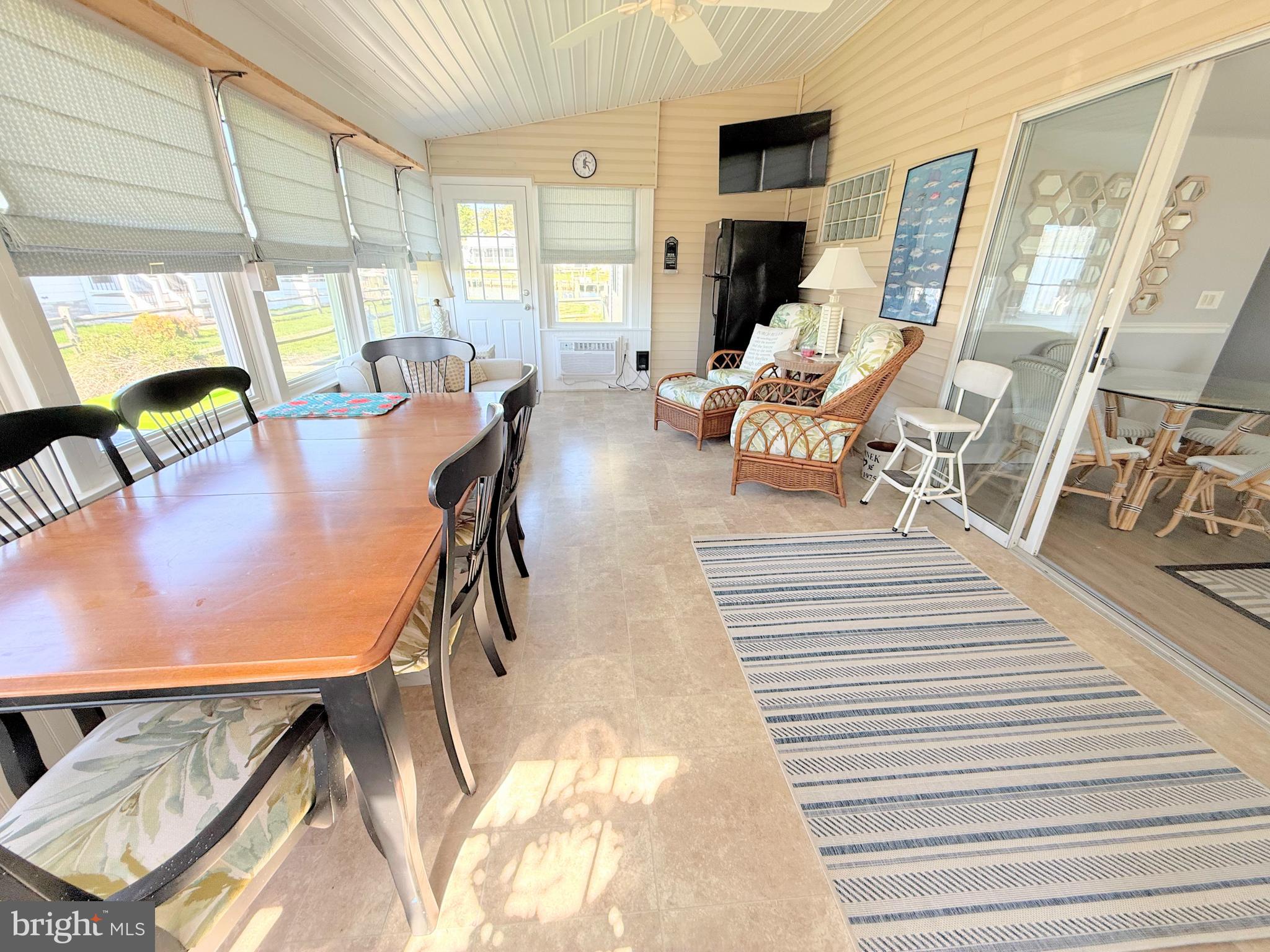 37219 Sandpiper Road, Unit 47 Long Neck, DE 19966 - Photo 17 of 62 sun room