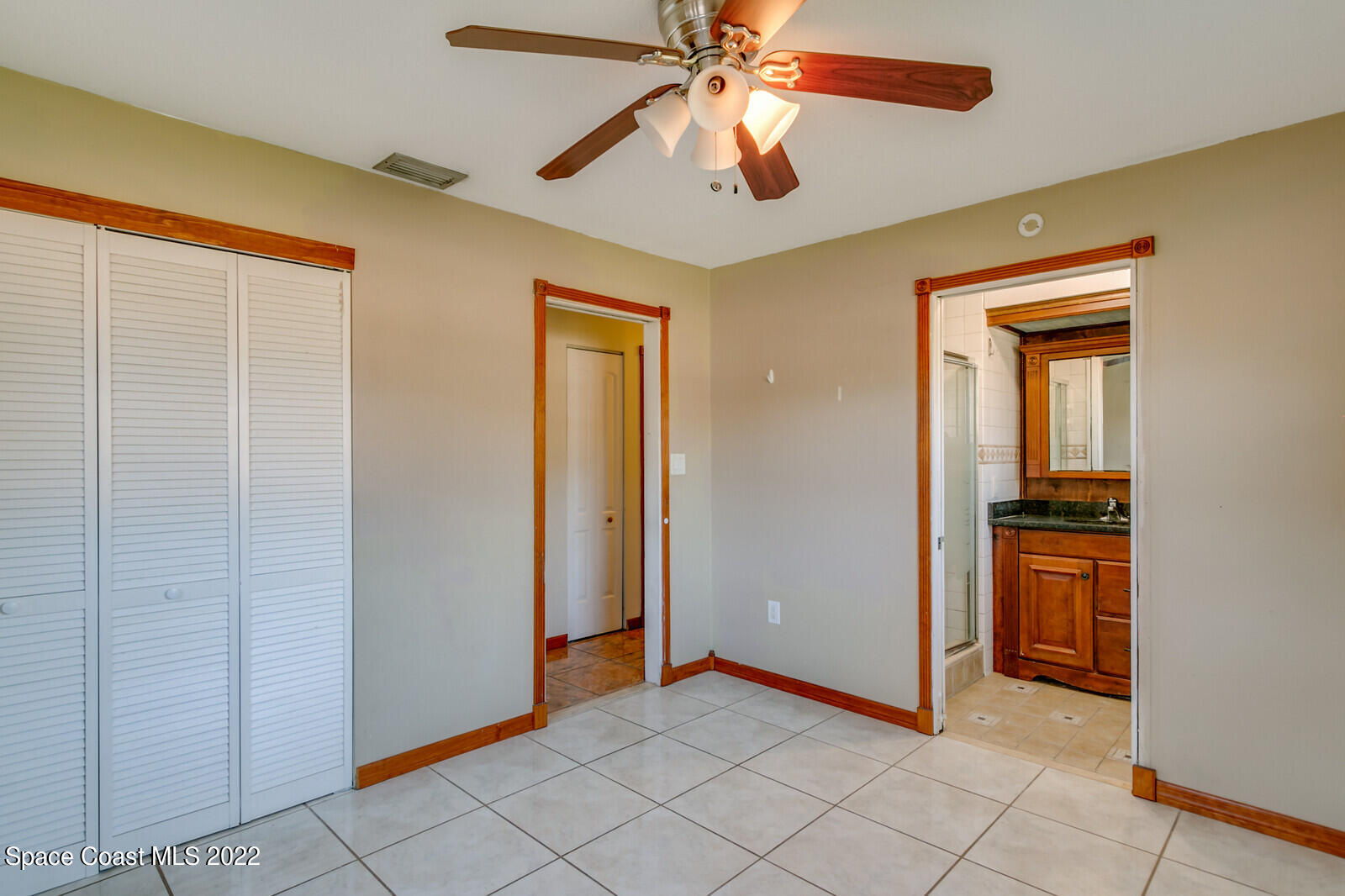 2655 Sarno Road Melbourne, FL 32935 - Photo 11 of 18 a view of an empty room with closet and a window