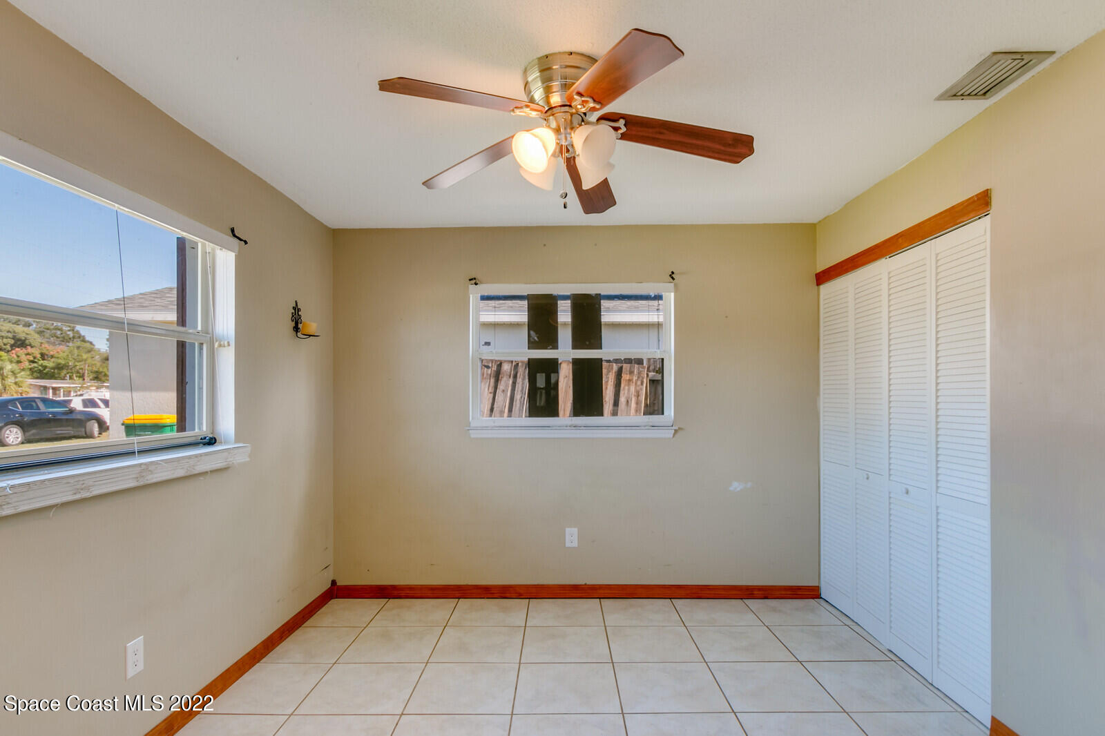 2655 Sarno Road Melbourne, FL 32935 - Photo 12 of 18 a view of an empty room with a window