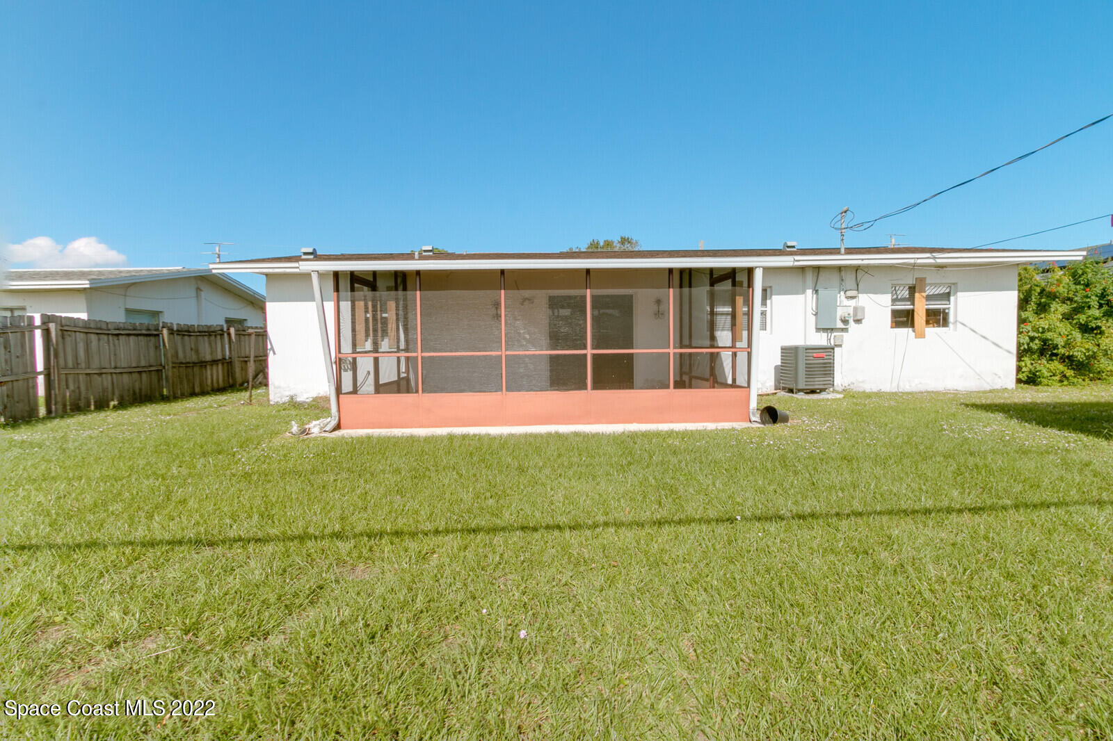 2655 Sarno Road Melbourne, FL 32935 - Photo 15 of 18 a view of a house with backyard and porch