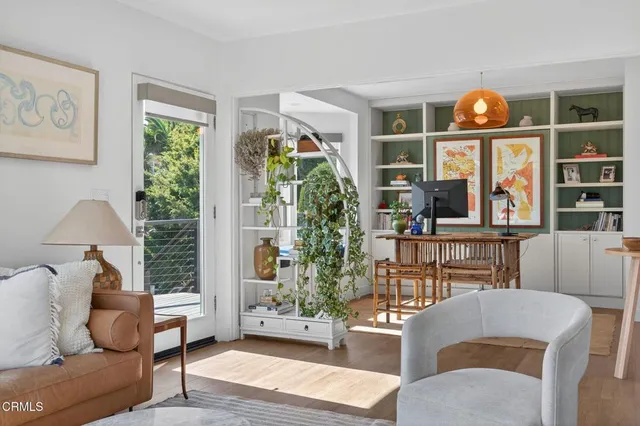 a kitchen with a stove and a refrigerator