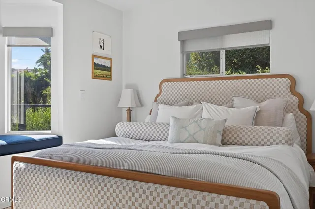 a view of a hallway with washer and dryer