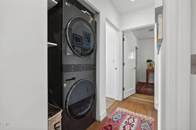 a view of a house with a chairs in a patio