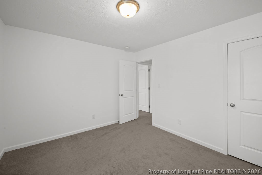6915 Wickersham Road Fayetteville, NC 28314 - Photo 14 of 25 a view of an empty room