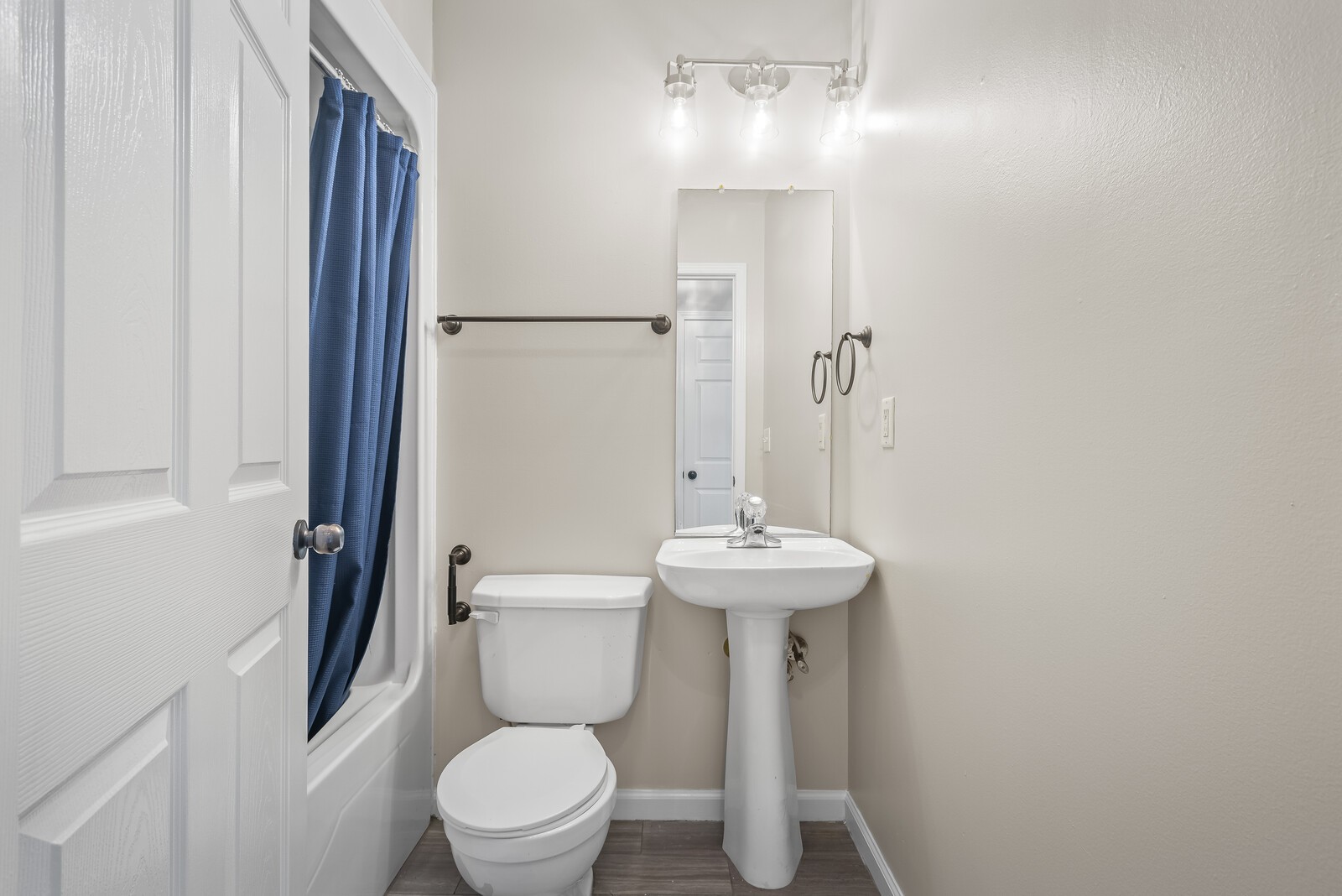 3850 Taylors Store Road Hampshire, TN 38461 - Photo 20 of 57 a bathroom with a toilet a sink and mirror