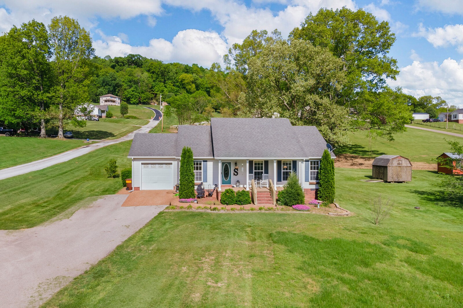 3850 Taylors Store Road Hampshire, TN 38461 - Photo 30 of 57 a view of a house with a yard