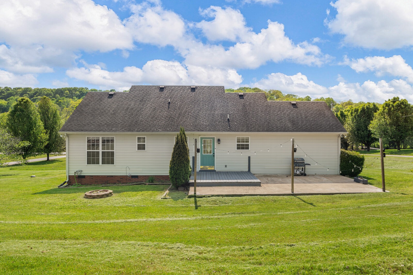 3850 Taylors Store Road Hampshire, TN 38461 - Photo 45 of 57 a view of a house with a backyard