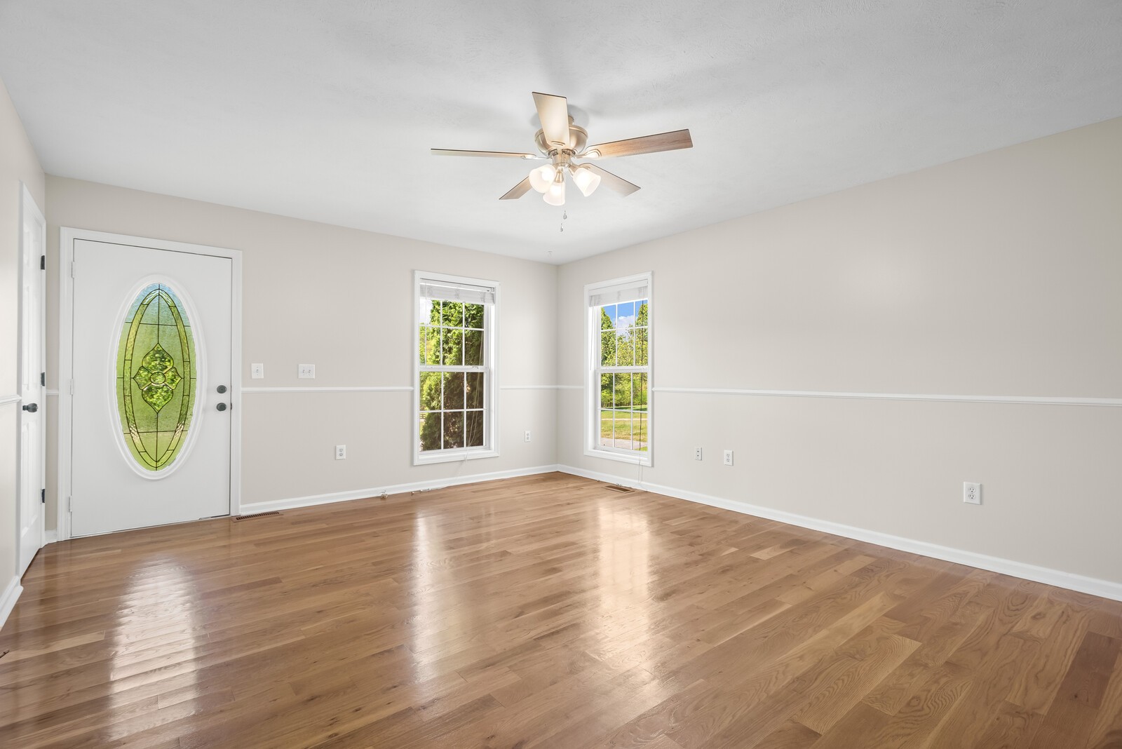 3850 Taylors Store Road Hampshire, TN 38461 - Photo 5 of 57 a view of an empty room with window and wooden floor
