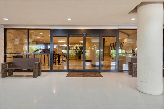 a view of a livingroom with furniture and a table