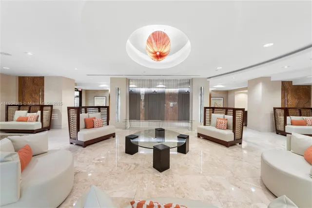 a view of a room with wooden floor and windows